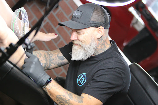 Find heart rate tattoo ideas for your next unique tattoo in Kissimmee at Fallen Heroes Tattoo & Piercing (Florida)