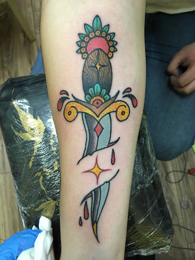 Explore side of hand tattoo ideas, creative tattoo ideas in Marysville, available at Elegant Arts Tattoo Parlor