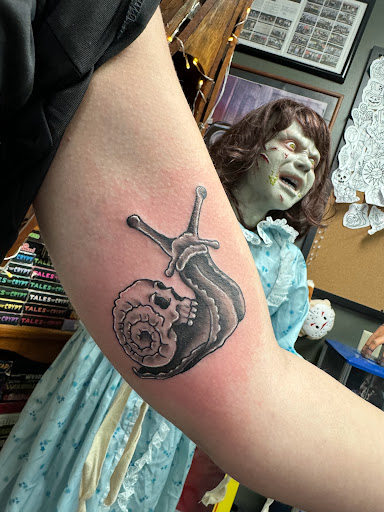 Explore july birth flower tattoo ideas, creative tattoo ideas in Vincennes, available at Silver Owl Tattoo