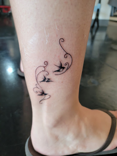 Explore june birth flower tattoo ideas, creative tattoo ideas in Kissimmee, available at Fallen Heroes Tattoo & Piercing (Florida)