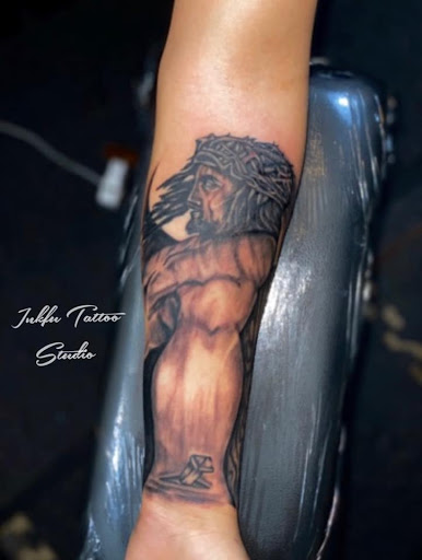 Explore black and grey realism tattoo ideas, creative tattoo ideas in Omaha, available at Inkfu Tattoo Studio