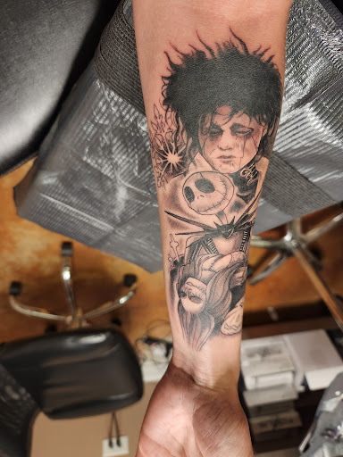 Explore tattoos for your son ideas, creative tattoo ideas in Geneva, available at Famous Street Tattoo Geneva