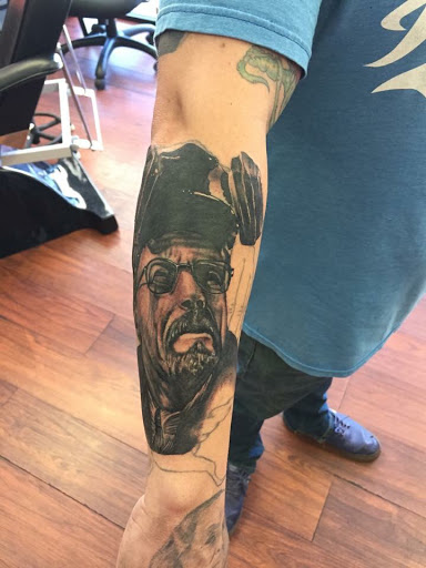 Explore little ghost tattoo ideas, creative tattoo ideas in Largo, available at Alchemy Tattoos and Body Piercings