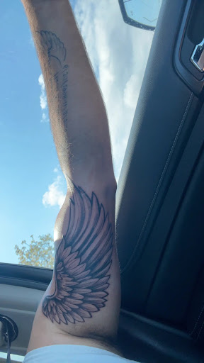 Explore family word tattoo ideas, creative tattoo ideas in Lakeville, available at Savage Ink