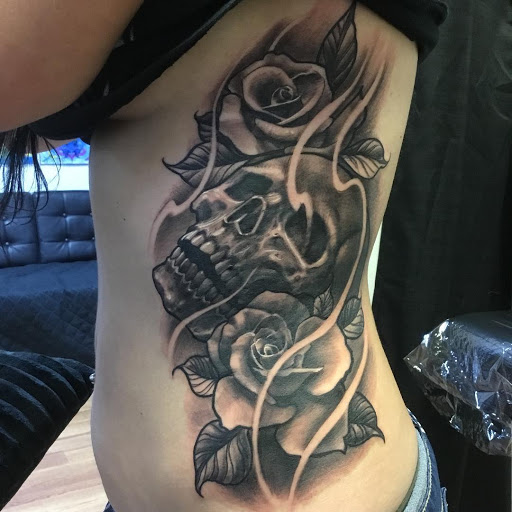 Tattoo Shop «Crossbones Tattoo & Piercings», reviews and photos, 19051 San Carlos Blvd #10, Fort Myers Beach, FL 33931, USA