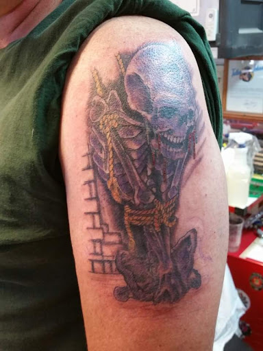 Explore tattoo ideas for men lower arm, creative tattoo ideas in Elko, available at Tom Custom Tattoos and Body Piercing Studio