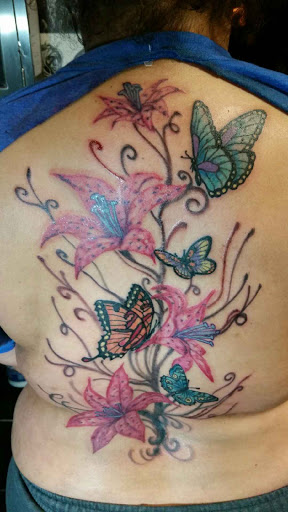 Explore western tattoo ideas for men, creative tattoo ideas in Erie, available at EliKingInk