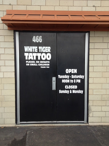 Tattoo Shop «White Tiger Tattoo», reviews and photos, 466 W Ridge Rd, Rochester, NY 14615, USA