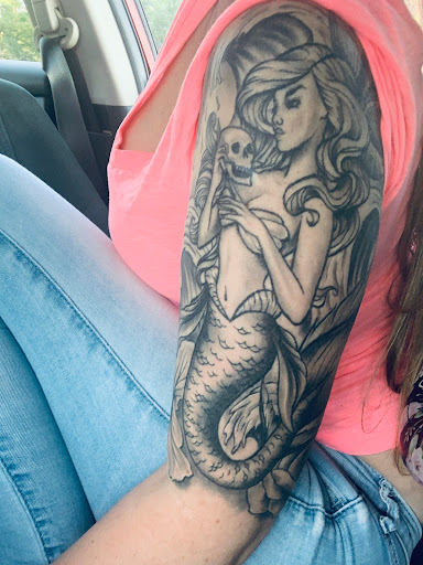 Explore trapped tattoo ideas, creative tattoo ideas in Melbourne, available at Bonnie n Clyde Tattoo Studio