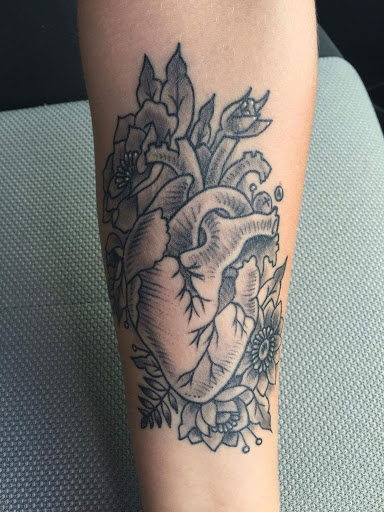 Explore strawberry tattoo ideas, creative tattoo ideas in Medina, available at Canalside Tattoo Company