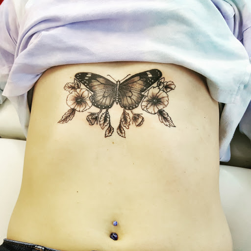 Explore shoulder tattoo ideas men, creative tattoo ideas in Redding, available at Caddy Daddys