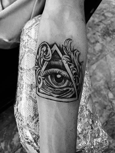 Explore middle finger tattoo ideas, creative tattoo ideas in Seymour, available at American Gypsy Tattoo Corp.