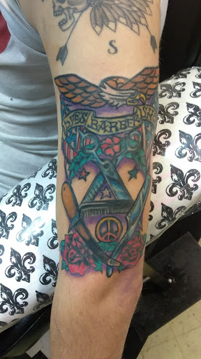 Explore dog tattoo ideas for guys, creative tattoo ideas in Bowling Green, available at Taboo Tattoos and Piercings