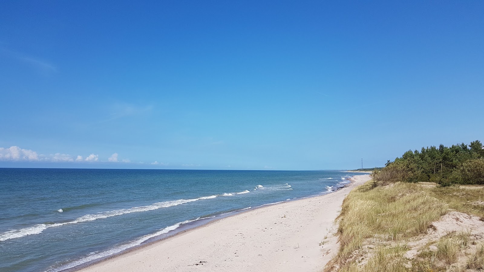Fotografija Liedagi recreation beach z svetel pesek površino