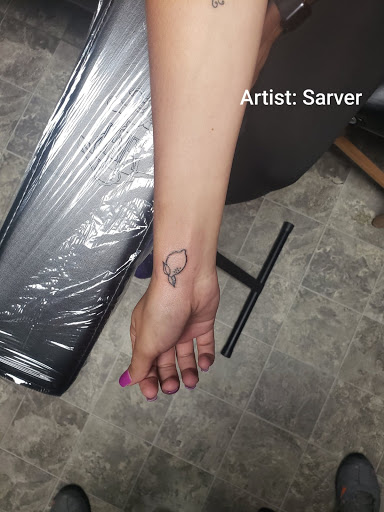 Explore ideas for matching couple tattoos, creative tattoo ideas in Ottawa, available at Precision Art