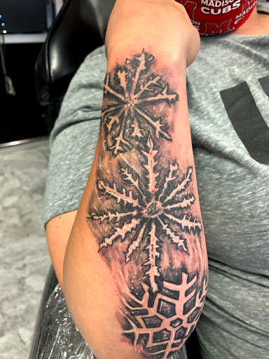 Explore autism awareness tattoo ideas, creative tattoo ideas in Seymour, available at American Gypsy Tattoo Corp.