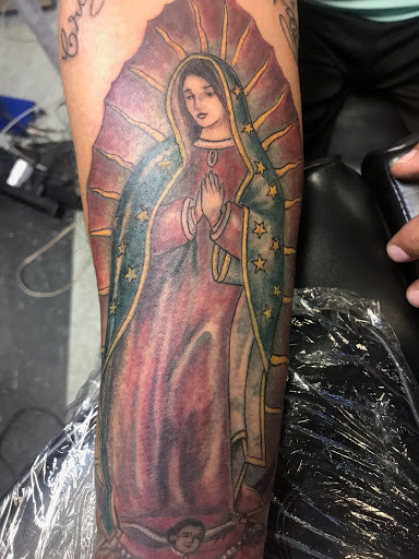 Explore half leg sleeve tattoo ideas, creative tattoo ideas in San Angelo, available at A1 Tattoos and Piercings