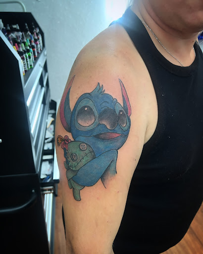 Explore alt tattoo ideas, creative tattoo ideas in Cocoa, available at Rorschach Tattoo Shop and Piercing Studio