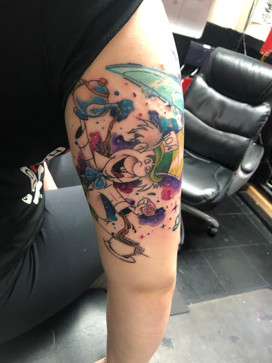 Explore back of arm tattoo ideas, creative tattoo ideas in Largo, available at Alchemy Tattoos and Body Piercings