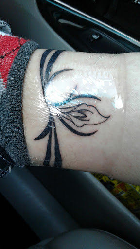 Explore cover up tattoo ideas male forearm, creative tattoo ideas in Carson, available at Southbay Tattoo