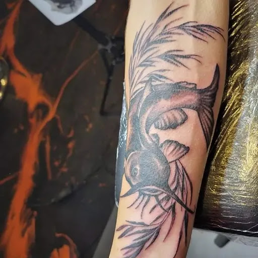 Explore bow tattoo ideas, creative tattoo ideas in Fremont, available at Eternal Tattoo And Body Piercing
