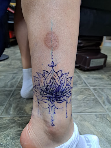 Find tropical flower tattoo ideas for your next unique tattoo in Houston at 247 TATTOOS AND PIERCINGS