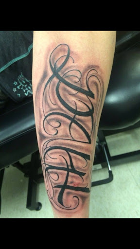 Explore female warrior tattoo ideas, creative tattoo ideas in Fargo, available at Golden Dragon Tattoo