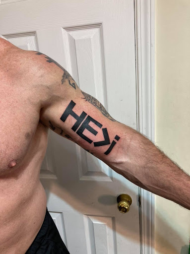 Explore wwe tattoo ideas, creative tattoo ideas in Williamsburg, available at Relentless Ink