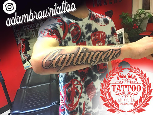 Explore arsenal tattoo ideas, creative tattoo ideas in Stuart, available at Urban Inkers Tattoos
