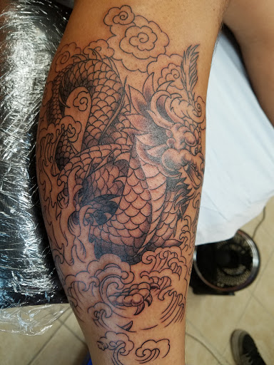 Explore hand name tattoo ideas, creative tattoo ideas in Bayville, available at Hot Rod INKIN Tattoos, Piercing & Permanent Cosmetics