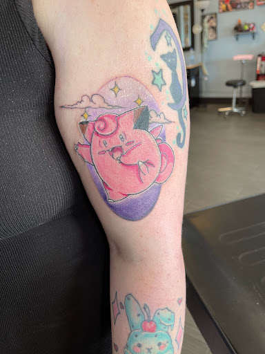 Explore rapper tattoos ideas, creative tattoo ideas in Palm Harbor, available at Angry Owl Tattoo and Piercing