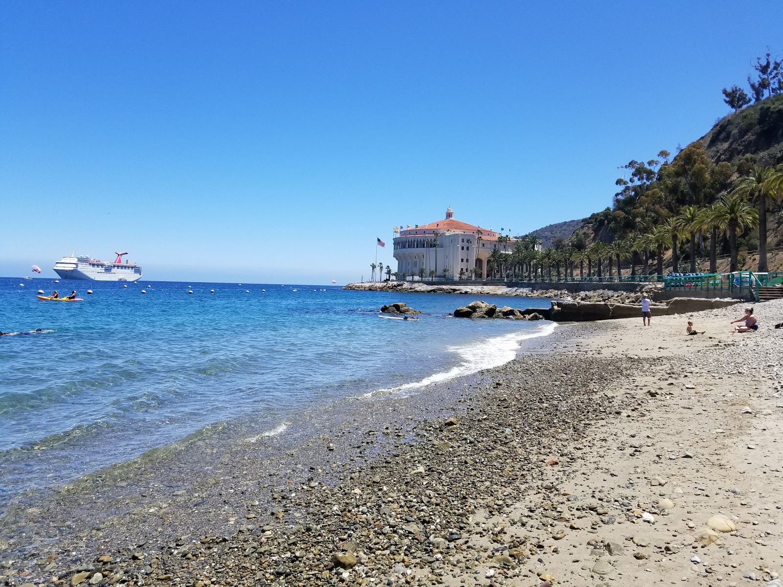 Foto af Descanso Beach med let sand og småsten overflade