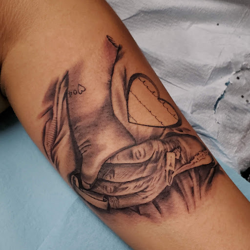 Explore top of foot tattoo ideas, creative tattoo ideas in Bakersfield, available at CLASSIC STANDARD TATTOO CO.