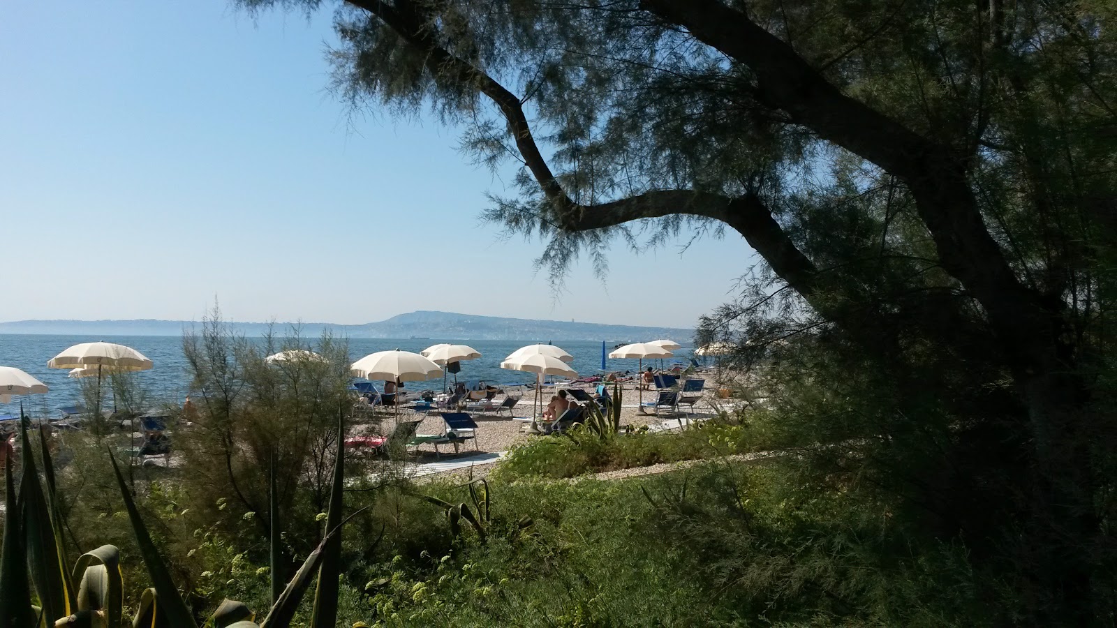 Foto av Spiaggia di Punta Quattroventi och bosättningen