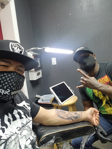 Tattoo Shop «House of Pain», reviews and photos, 2850 E Foothill Blvd # 205, Rialto, CA 92376, USA