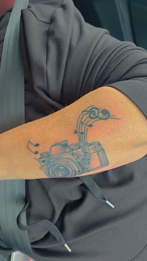 Explore inner bicep tattoo ideas for men, creative tattoo ideas in Gallipolis, available at Temple Tattoo & Body Piercing