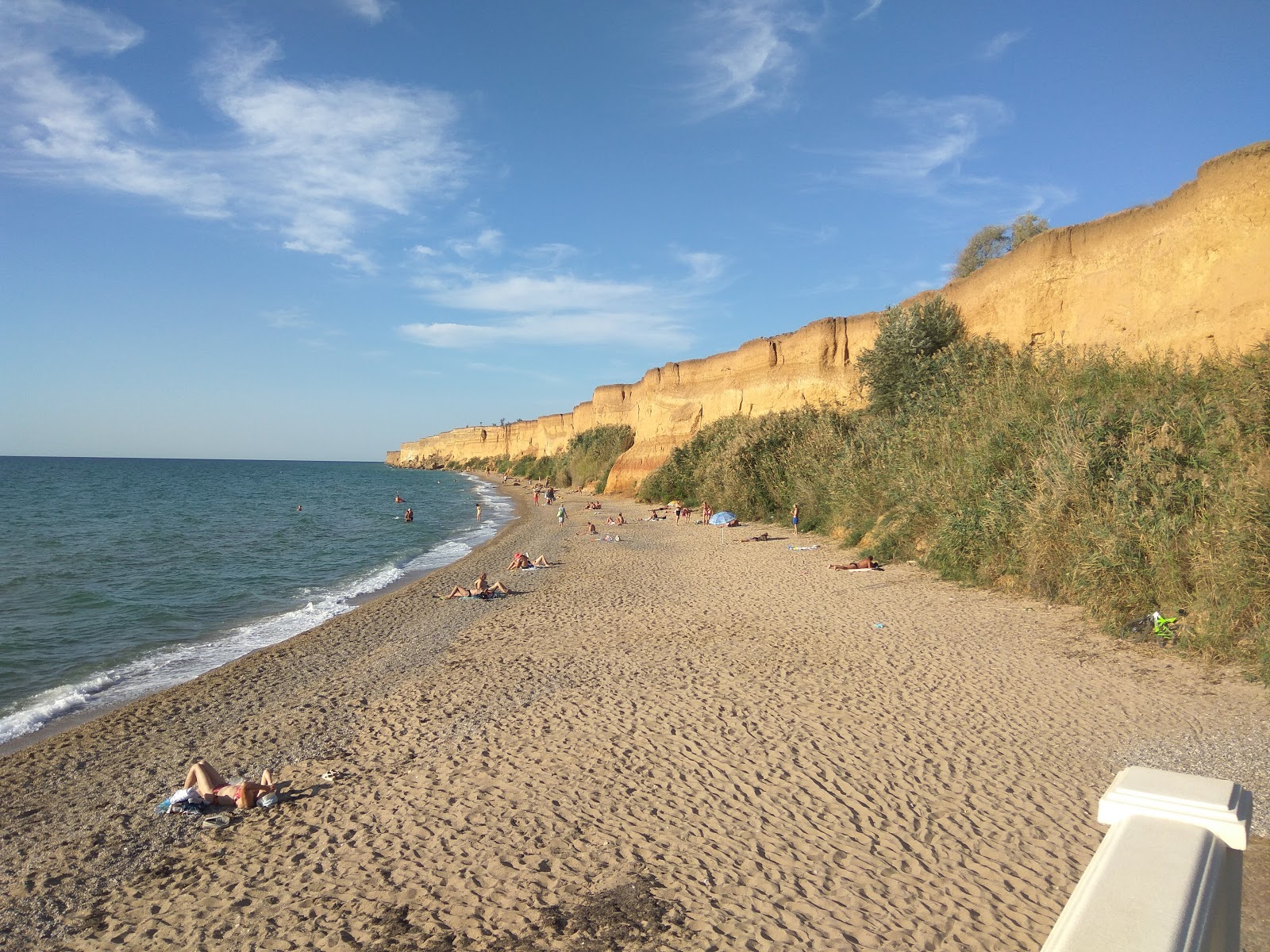 Foto van Andreevka beach met beige zand oppervlakte