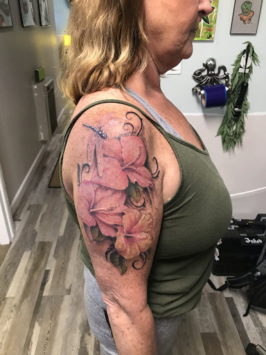 Explore cherub tattoo ideas, creative tattoo ideas in Ocala, available at The Tattoo Gallery of Ocala LLC