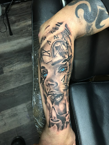 Explore men back tattoo ideas, creative tattoo ideas in Warner Robins, available at Untold Pain Tattoo Studio