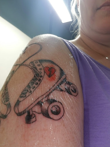 Explore rose tattoo ideas for guys, creative tattoo ideas in Egg Harbor Township, available at The Inkuisition