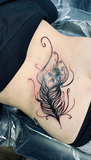 Explore 3 cat tattoo ideas, creative tattoo ideas in Lake City, available at Crooked Spines Tattoo Studio
