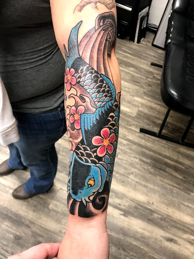 Explore tattoo finger ideas, creative tattoo ideas in Lake Bluff, available at Evolution Body Arts