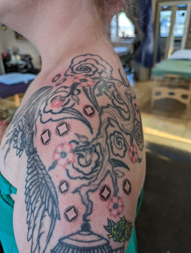 Explore juice wrld tattoo ideas 999, creative tattoo ideas in Fargo, available at The Inked Huntress Tattoo Studio