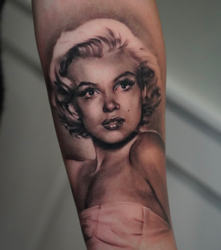 Explore cover up lower back tattoo ideas, creative tattoo ideas in Farmingville, available at LizArt Ink tattoo