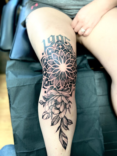 Explore thigh tattoo ideas for men, creative tattoo ideas in Menomonie, available at Blue Dragon Tattoo