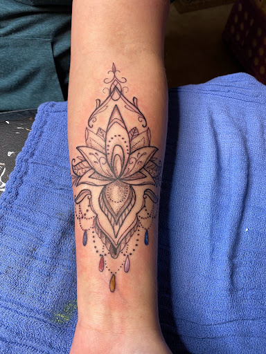 Explore small fingerprint tattoo ideas, creative tattoo ideas in Moweaqua, available at Fleshwound Tattoo