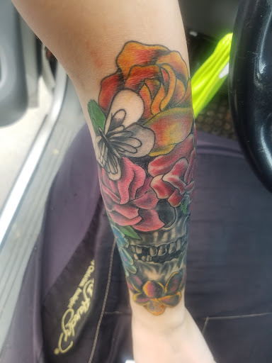 Explore state tattoo ideas, creative tattoo ideas in Hermitage, available at Lone Wolf Tattoo Nashville