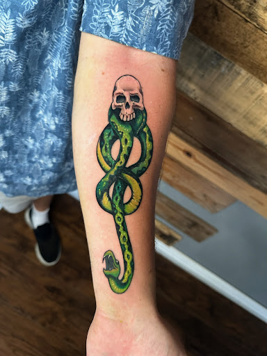 Explore neck and shoulder tattoo ideas, creative tattoo ideas in Benson, available at Dark Matter Tattoo Studio