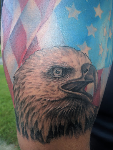 Explore hellscape sleeve tattoo ideas, creative tattoo ideas in Myrtle Beach, available at Elite Ink Tattoos of Myrtle Beach