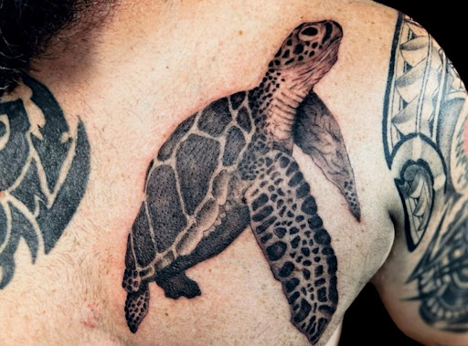Explore biceps tattoo ideas, creative tattoo ideas in Honolulu, available at Aloha Tattoo Waikiki Hilton Hawaiian Village Rainbow Bazaar